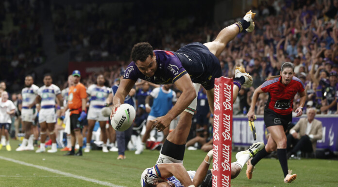The Melbourne Storms’ Xavier Coates scores a miracle try to snatch victory from the Warriors.  PHOTO/GETTY IMAGES